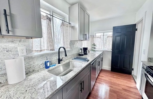 Clinton Township Casa | Stylish, Spacious, 4 TV's, Game Room w/ Bar and Lounge Area