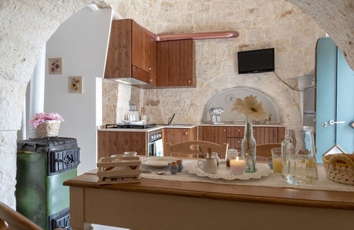 Castellana Grotte Villa | Trulli con estilo con piscina privada para 4 personas en Puglia