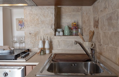 Castellana Grotte Villa | Trulli con estilo con piscina privada para 4 personas en Puglia