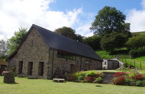Llanwrtyd Wells Casa | Granero con estilo convertida en Llanwrtyd Wells, tiene capacidad para 10 personas, vistas espectaculares