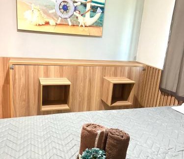 Foguete Hotel | Suíte 31 Privativa com ar condicionado, Frigobar, Vista lateral para o mar, 5 mts da praia