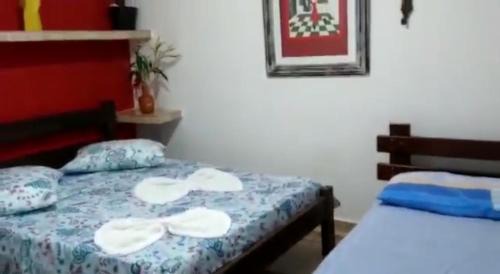 Bairro da Enseada Casa | Suíte 9 com piscina e wi-fi em Caraguatatuba
