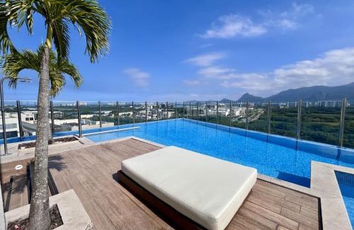 Jacarepagua Casa | Suíte com varanda e piscina na Barra da Tijuca - RJ