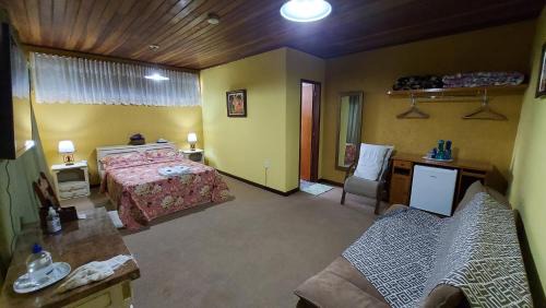 Teresopolis Apartamento | Suíte com vista da Serra