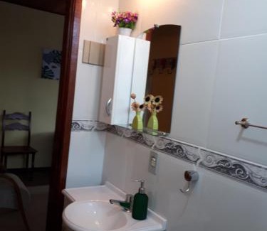 Teresopolis Apartamento | Suíte com vista da Serra