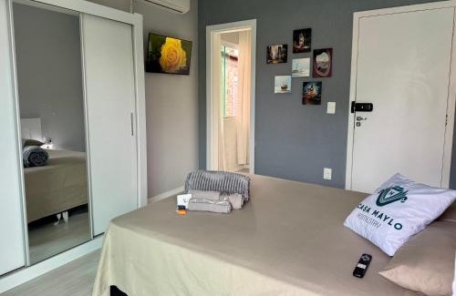 Capoeiras Casa | Suíte Conforto com AR, TV e sacada em Florianópolis