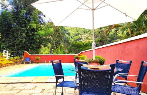Nogueira Casa | Su Paradise Villa Chalés e Suítes