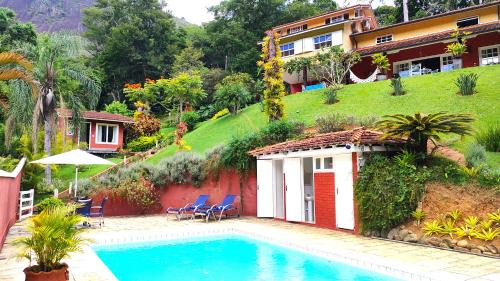 Nogueira Casa | Su Paradise Villa Chalés e Suítes