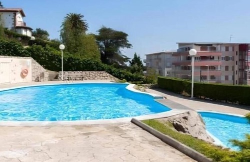 Suances Apartamento | Suances con garaje privado, piscina , pie de playa