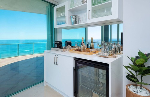 Main Beach Apartamento | Este sub-ático de 3 dormitorios con vista al mar tiene una extensa playa, océano, ci