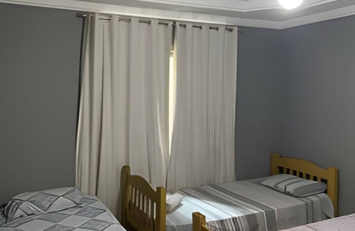 Ipiranga Apartamento | Suite 6 · Suíte Confortável 3 Camas Solteiro VI