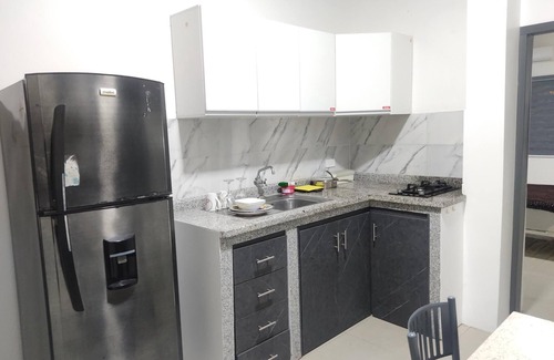Portoviejo Apartamento | suite acogedora y equipada, garaje con control, segura junto al parque Rotonda