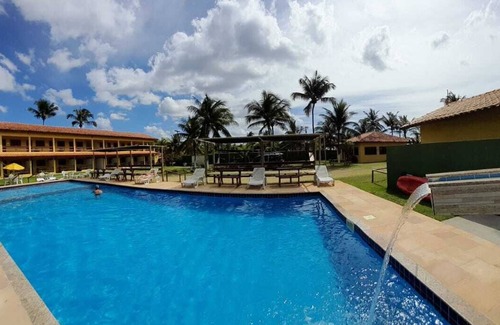 Canavieiras Apartamento | Suite on the seafront with air conditioning and crystal-clear swimming pool.