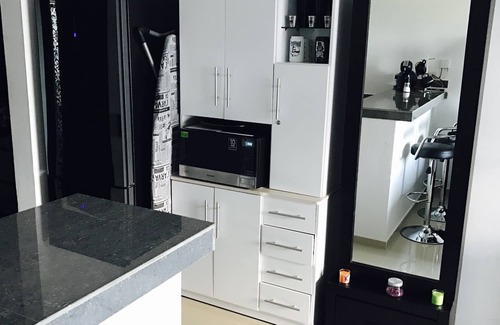 Cozumel Apartamento | Suite con piscina a 500m de la playa con coche de alquiler.