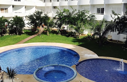 Cozumel Apartamento | Suite con piscina a 500m de la playa con coche de alquiler.