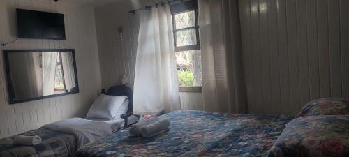 Vila Inglesa Casa | SUITES E QUARTOS CASA PAPAI NOEL