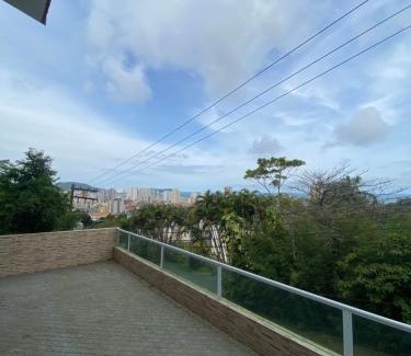 Jardim Praiano Casa | Suites mirante da Enseada