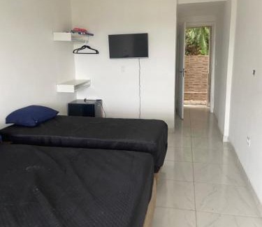 Jardim Praiano Casa | Suites mirante da Enseada