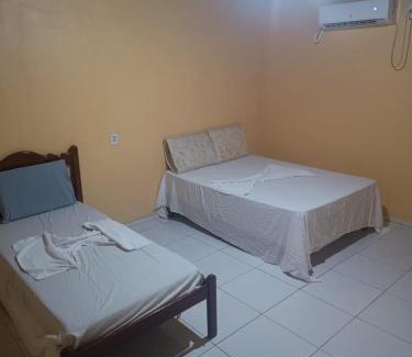 Iranduba Casa | Suites para casais com area nativa