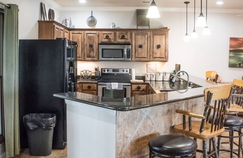 Gruene Condominio | Summer Price Drops! Ask about free night! on the Guadalupe River in Gruene!