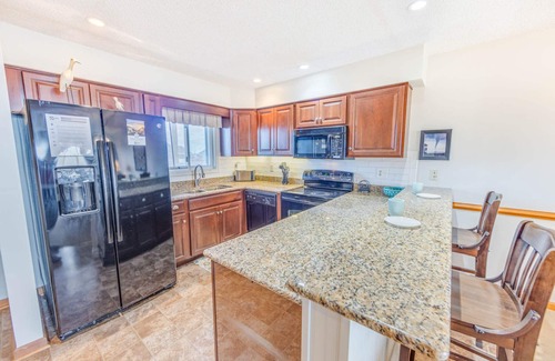 Rodanthe Condominio | Acogedor Semi-Oceanfront Rodanthe Condo-Resort Piscina y elevador, Paseo de la playa