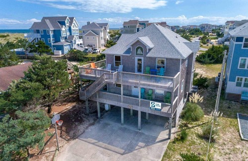 Ocean Isle Estates Casa | SUMMER SAVINGS - Semi-Oceanfront Home with Hot Tub, Smart TVs, Basketball Hoop