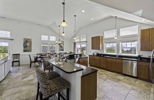 Wind Over Waves Casa | SUMMER SAVINGS- Soundside Dog Friendly Home w Pool, Hot Tub, Basketball, Theater