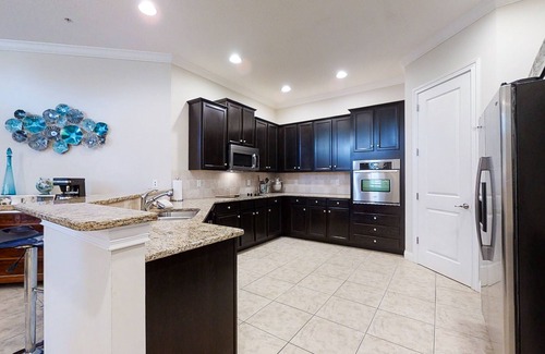 American Beach Casa | Summerwoods end-unit condo with an outdoor pool, central AC, & washer/dryer