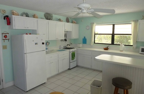 Great Exuma Villa | Casa Sundowner, frente a la playa, una de las mejores vistas de la isla. Duerme 6.