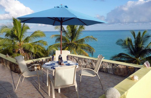 Great Exuma Villa | Casa Sundowner, frente a la playa, una de las mejores vistas de la isla. Duerme 6.