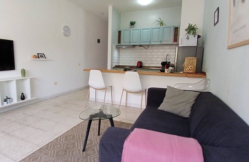Puerto del Rosario Apartamento | Sunlit apt steps from beach! Cozy and modern. Walk everywhere. Perfect getaway!