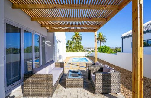 Shelley Point Casa | Sunlit Oasis Ocean & Golf Retreat by Host Agents