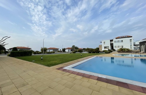 Tatlisu Apartamento | Sunny Cypriot Apartment W/ Site Pool, Gym and Kids playing area!
