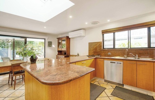 Broadbeach Waters Villa | Sunny Days Poolside at an Entertainers Oasis
