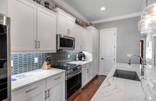 Villa Lago Casa | Sunny getaway with 2 golf carts, patio, grill, pool, & tennis