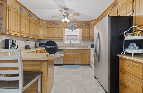 Jacksonville Casa | Sunrise@Sunset- 4BR/2BA home, with gameroom, large backyard & covered back porch