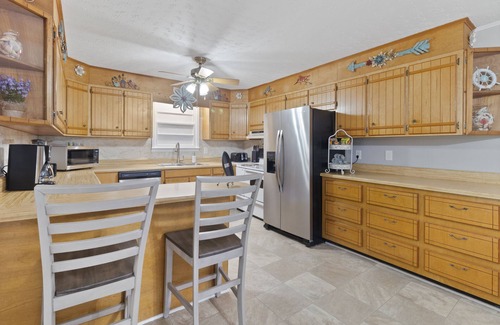 Jacksonville Casa | Sunrise@Sunset- 4BR/2BA home, with gameroom, large backyard & covered back porch