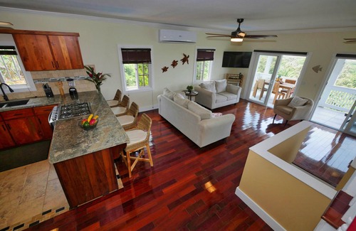 Sandy Bay Casa | Sunset and Ocean views at Sandy Feet Retreat with private infinity pool.