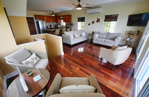 Sandy Bay Casa | Sunset and Ocean views at Sandy Feet Retreat with private infinity pool.