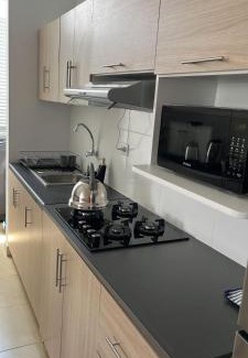 La Banda de Shilcayo Apartamento | Sunset Apartments - Encantador Departamento