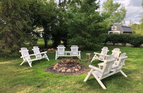Amery Cabina | Sunset Cottage on Lake Wapogasset, Amery WI with Bunk Room, Hot Tub, AC, & more