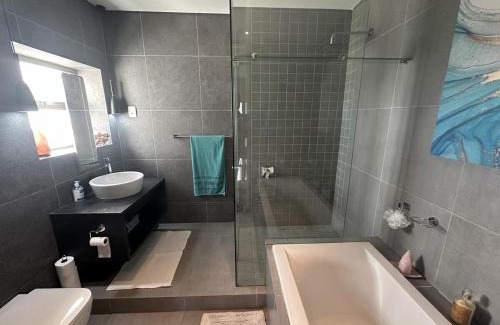 Cape Town Casa | Sunset Links Golf Estate home, walk to Beach
