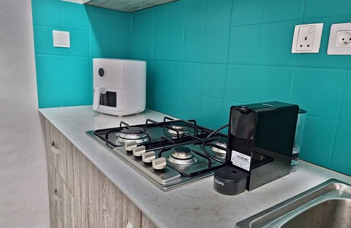 Flic-en-Flac Apartamento | Sunset Sanctuary Retreats, 30 meters from the Beach with Pool and 5G WiFi