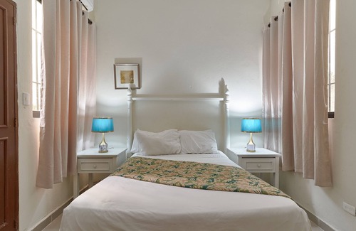 Zona Colonial Hotel | Sunset Terrace Suite: Stylish 1BD/1BA Oasis with Views of the Zona Colonial