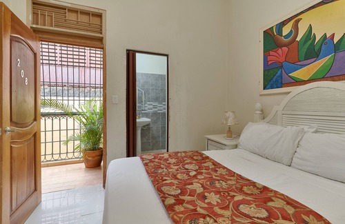 Zona Colonial Hotel | Sunset Terrace Suite: Stylish 1BD/1BA Oasis with Views of the Zona Colonial