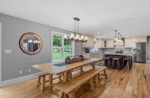 Gilford Casa | Sunset Veranda with peekaboo views of Winnipesaukee!
