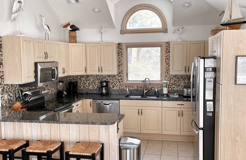Corolla Light Casa | Sunset Views! Waterfront in Corolla Light. Pool, Hot Tub. Dog Friendly. Elevator