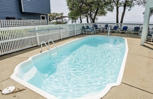 Corolla Light Casa | Sunset Views! Waterfront in Corolla Light. Pool, Hot Tub. Dog Friendly. Elevator