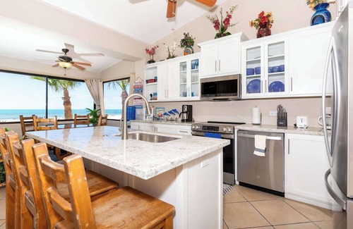 Bella Vista Condominio | Increíble Condominio Frente al Mar en Nivel de Planta Baja en Sandy Beach