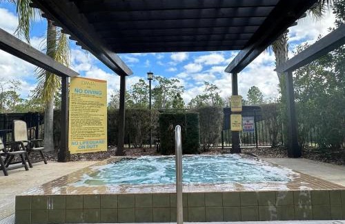 Florida Central Atlantic Coast Casa | Super Lux 4BR Townhouse - 1 Mile from Disney World- Resort Pool & Jacuzzi , Gym, with Enchanted Garden